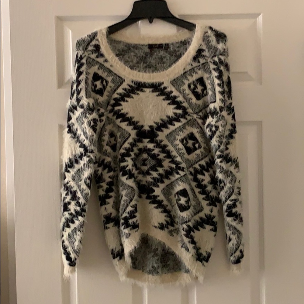 Black and cream sweater
